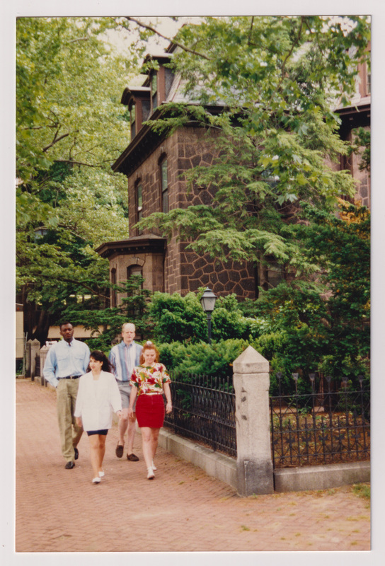 Admissions Building with 4 People Walking