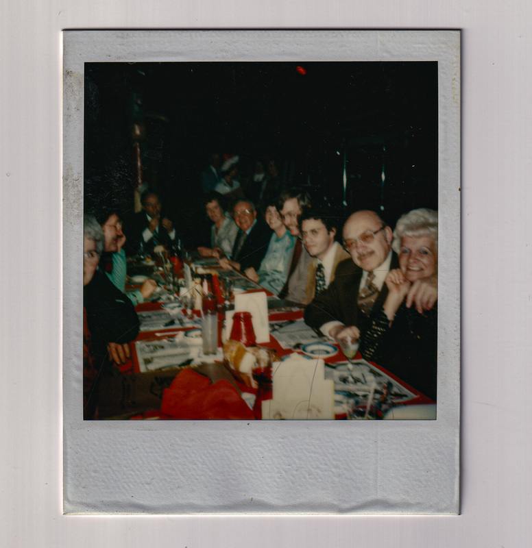 Sitting on One Side of Table at Holiday Party 2