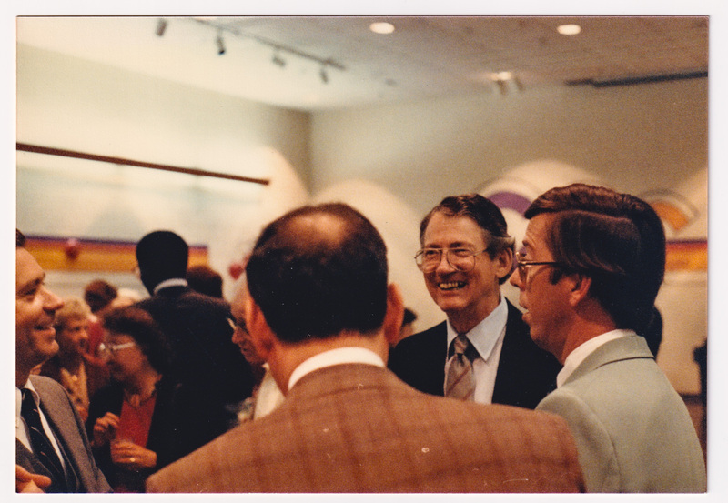 Close up of Four People in Conversation