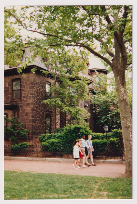 Admissions Building with 4 People Walking, From the Side