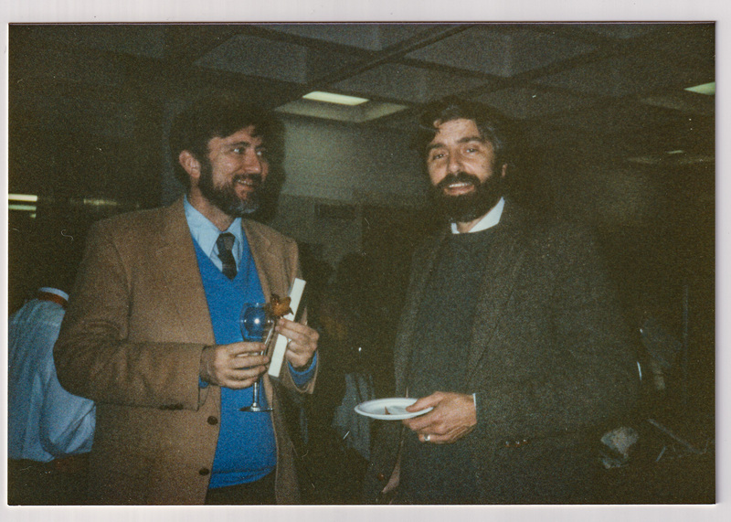 Two Men with Refreshments at Library Party