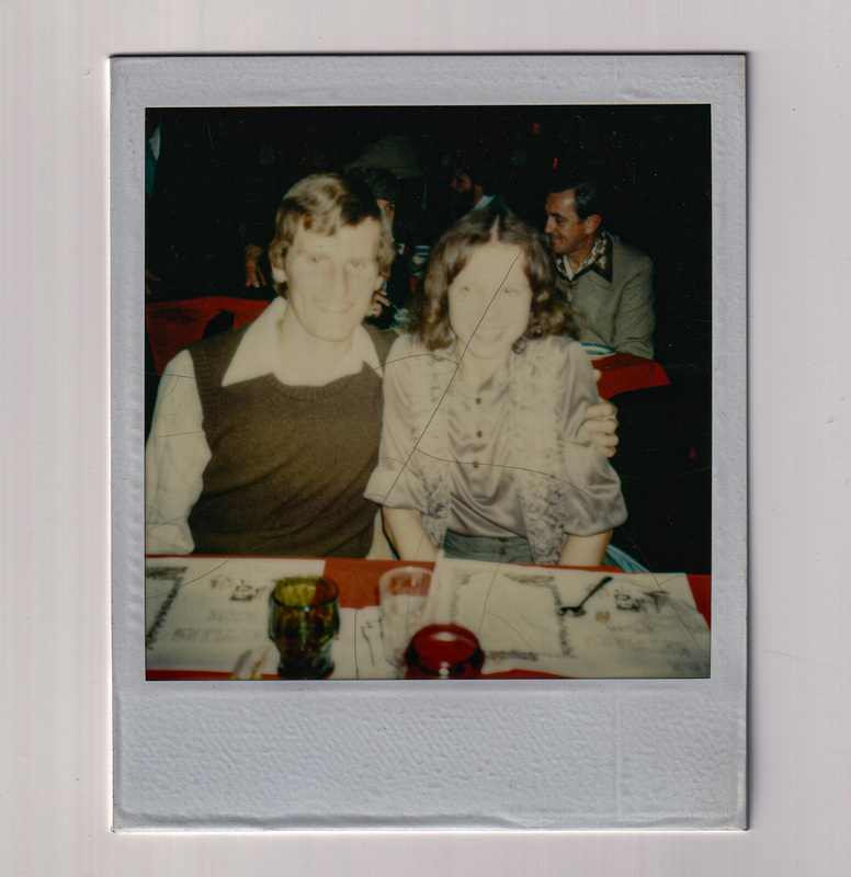 Washed Out Pair of People at the Holiday party.