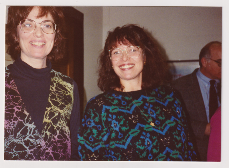 Two Women Smile at the Party