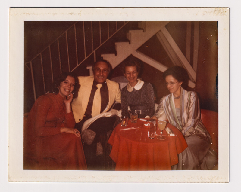 Pat, Elaine, Sam, and Linda at Small Holiday Party Table