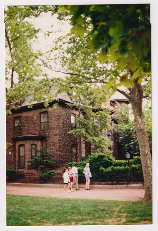 Admissions Building with 4 People Walking from Distance