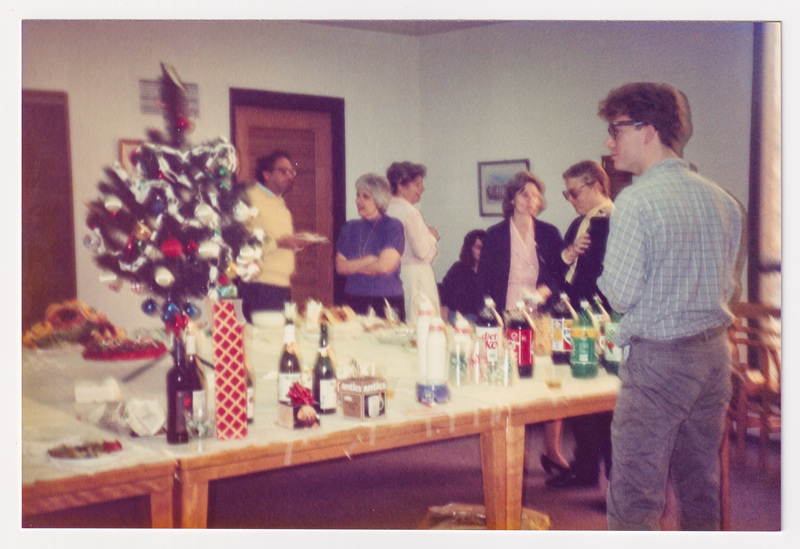 Blurry Photo of Holiday Refreshment Table and People