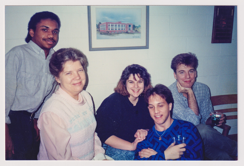 Five People Posing with Drinks